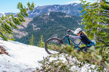 female mountain biker in snow