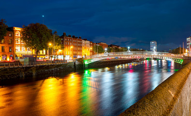 Ha'Penny Bridge at twilight blue hour - Dublin, Ireland.