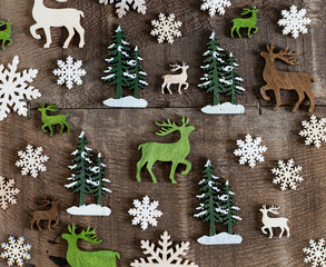 Hintergrund mit kleinen Hirschen und Baeumen