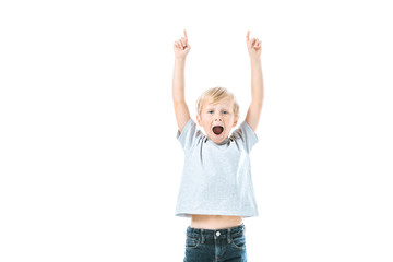 excited kid with opened mouth pointing with fingers isolated on white