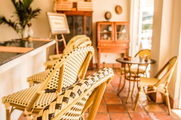 Restaurant interior design with vintage chairs and tropical style