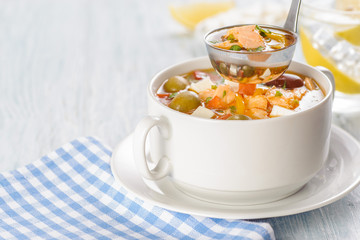 Fish soup with salmon and vegetables.
