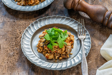 Mushroom, chorizo and thyme risotto with rocket lettuce