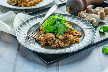 Mushroom, chorizo and thyme risotto with rocket lettuce