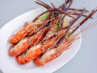 grill lobsters on white plate