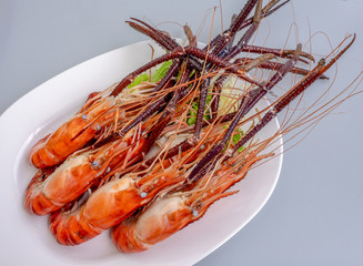 grill lobsters on white plate