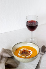Pumpkin soup on a white background. Healthy eating.