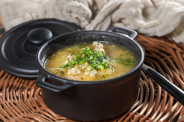 Barley soup with vegetables and chicken.