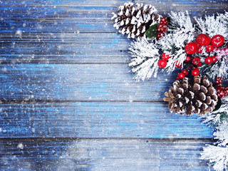 winter background with fir branches cones and snow