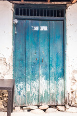 Typical Colombian facades, colorful door.