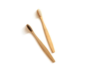 Two bamboo toothbrush isolated on white background. Zero waste concept.