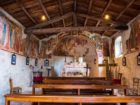 Old italian Chapel with wooden roof 
