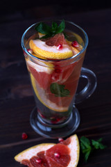 healthy eating. fresh red cocktail with ripe grapefruit and orange. detox water. diet healthy eating and weight loss concept. top view