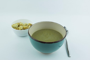 Cream of lentil and zucchini soup with chicken and parsley