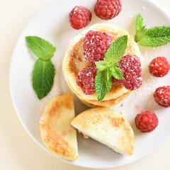 Cottage cheese pancakes with fresh raspberries
