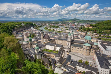 Fototapeta na wymiar Beautiful view of the old town of Salzburg from the Festung Hohensalzburg of the Salzach with the Dom zu Salzburg, the Franziskanerkirche, the Kapitelplatz and the Stift St. Peter, Austria