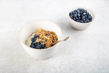 Fototapeta na wymiar Healthy breakfast from quinoa granola