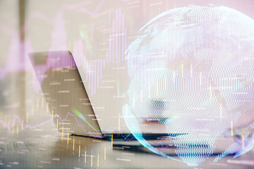 Multi exposure of chart and financial info and work space with computer background. Concept of...
