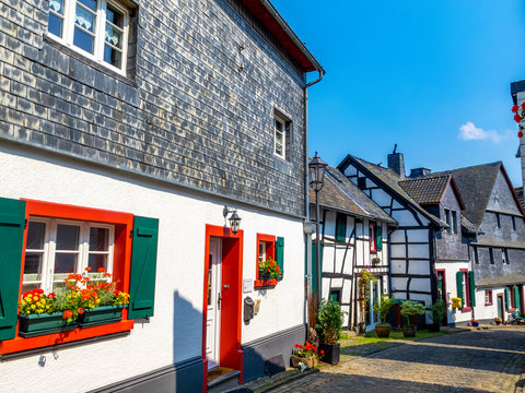 Reifferscheid in Hellenthal, North Rhine-Westphalia, Germany streetscape with old buildings on a sunny summer day