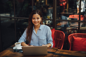 Asian woman in cafe