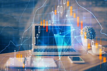 Financial graph colorful drawing and table with computer on background. Double exposure. Concept of international markets.