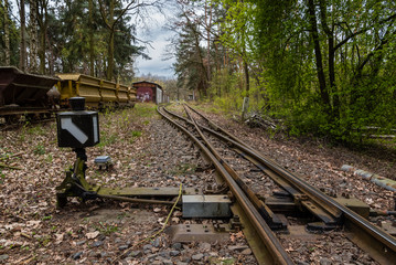 railway switch in forest, railroad switch