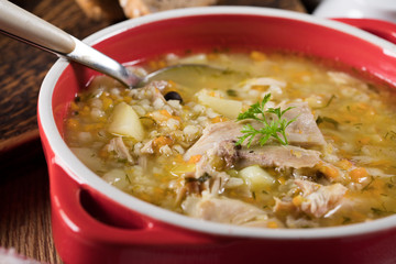 Barley soup with vegetables and chicken.