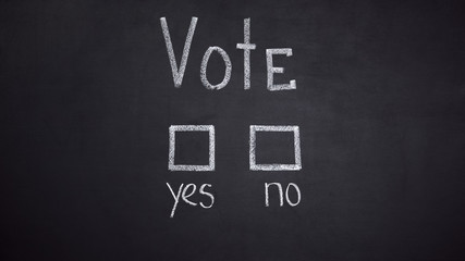 Obraz premium No and yes answers in vote written on blackboard, election concept, decision