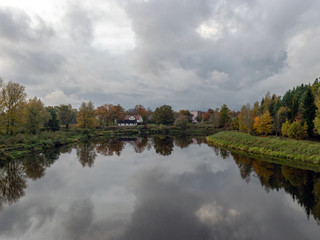 lake view, beautiful colorful trees, reflections in the water