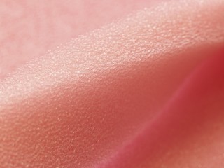 White pink artificial foam, soft texture on a light background.