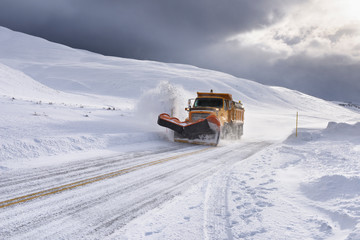 Yellow Snow Plow Clearing Snow in Wyoming