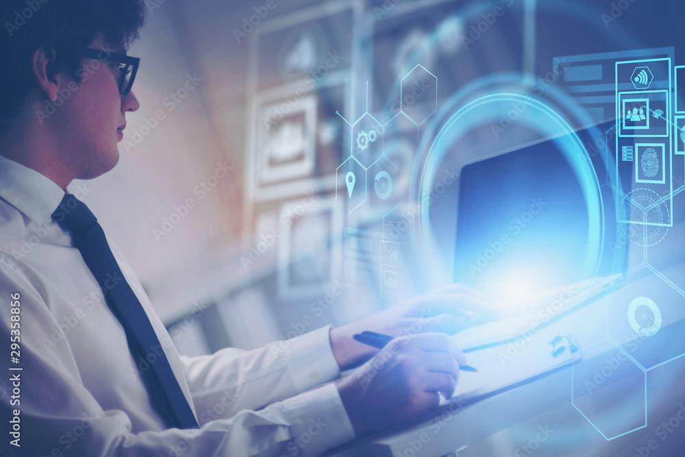 Aufkleber man working with futuristic interface in office