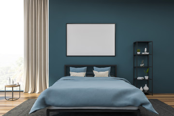Blue bedroom with horizontal poster