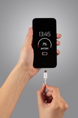 Elegant hand charging cellphone with low battery