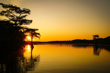 Fototapeta na wymiar Sunset view over Caddo Lake near Uncertain, Texas