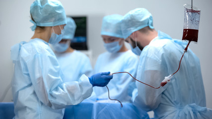 Intravenous drip in operation room, blood transfusion during surgery, hospital