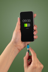 Elegant hand charging smartphone with low battery