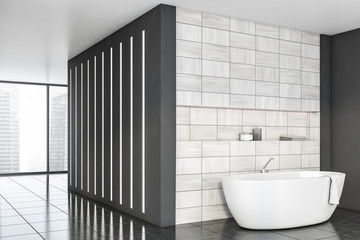 Gray and wooden tile bathroom corner with tub
