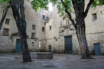 Plaza de Sant Felip Neri, square with the fountain in gothic quarter, Barcelona