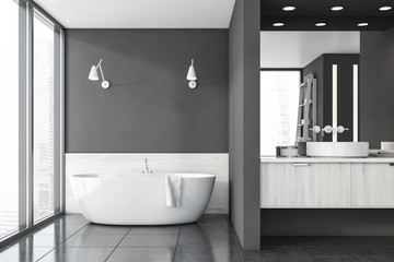 Fototapeta na wymiar Luxury gray and wooden bathroom interior