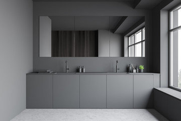 Gray and wooden bathroom with double sink