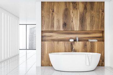 Naklejka na ściany i meble White and light wood bathroom interior with tub
