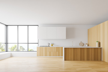 Spacious wooden and white kitchen interior