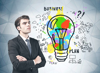 Confident young businessman and his bright idea