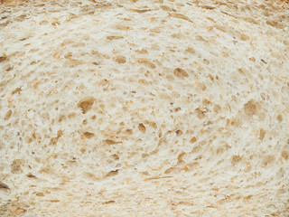 texture of slices of white bread with bran closeup
