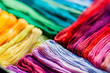 background of colorful skeins of yarn