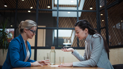 young HR woman interviews a candidate for a job.