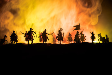 Medieval battle scene with cavalry and infantry. Silhouettes of figures as separate objects, fight...