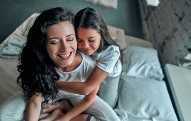 Mom and daughter in the bedroom