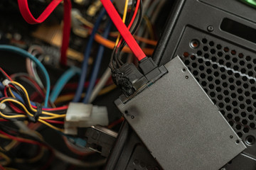 burned ssd, charred computer wiring, short circuit, fused power cable